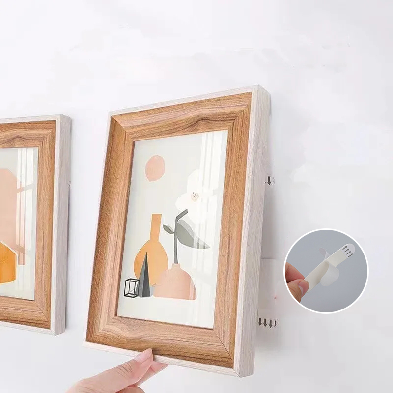 شرائط لاصقة لتثبيت الإطارات بد - مراجعة Picture Hanging Strip وسعره